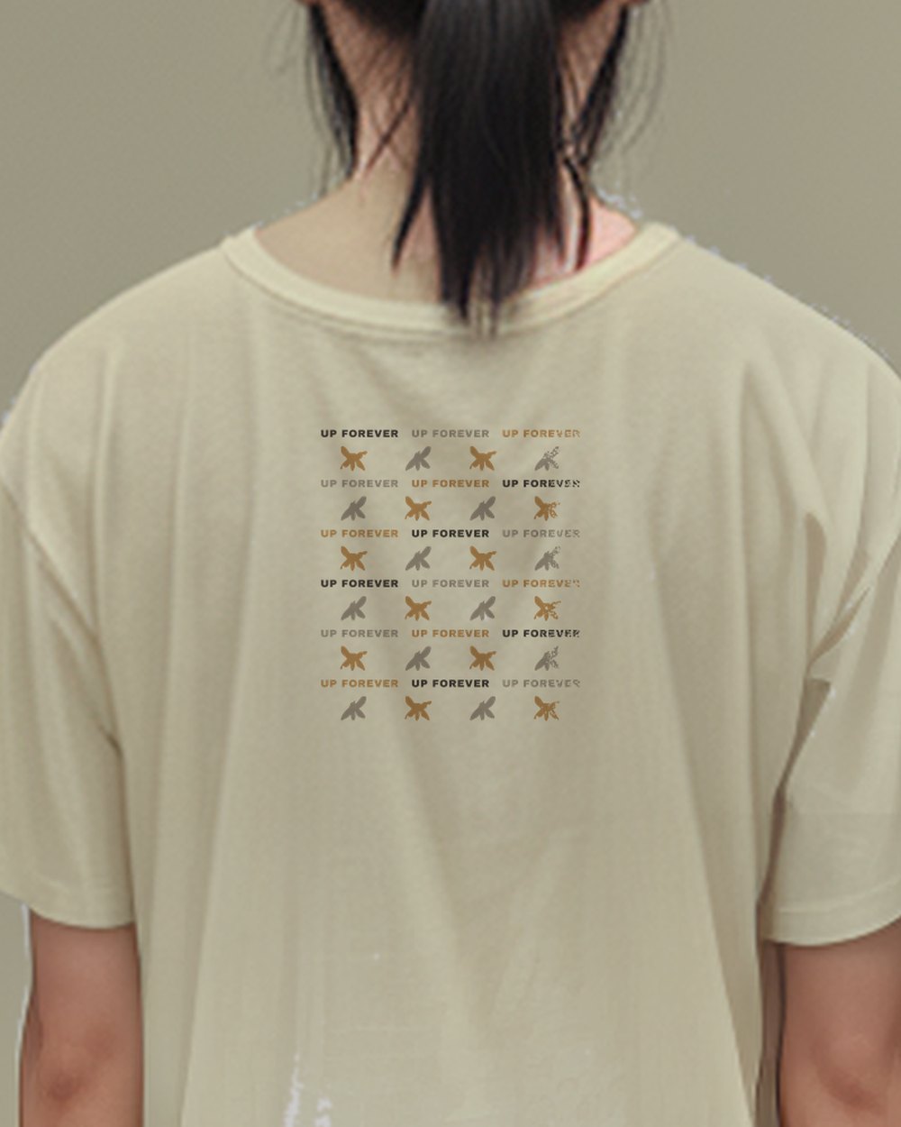 Mono Repeat: a monochrome photocopy logomania field, the wordmark and a small moth alternating, on an oversized boxy tee